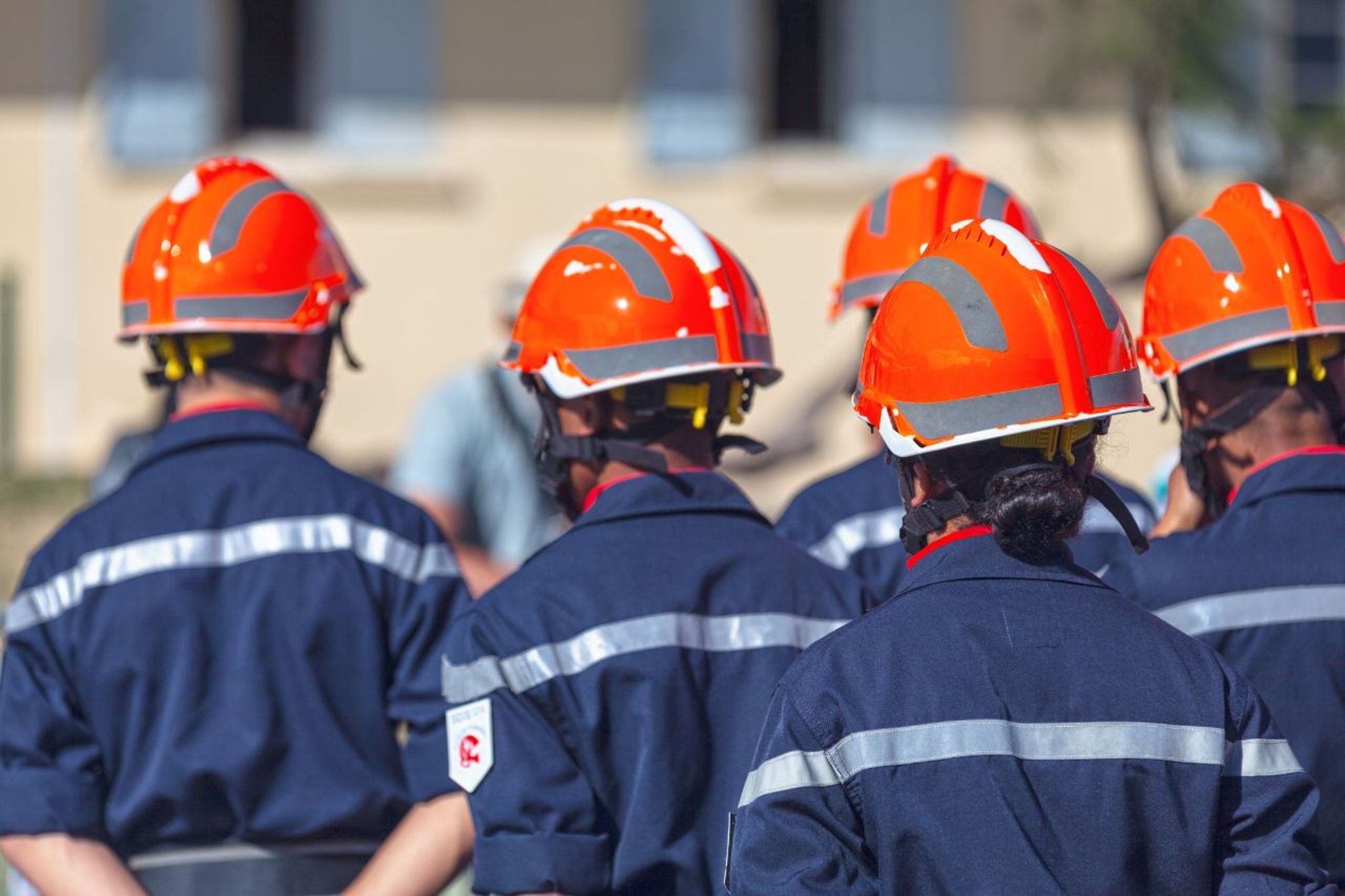 practitioners of forensic certificate programs wearing safety hats