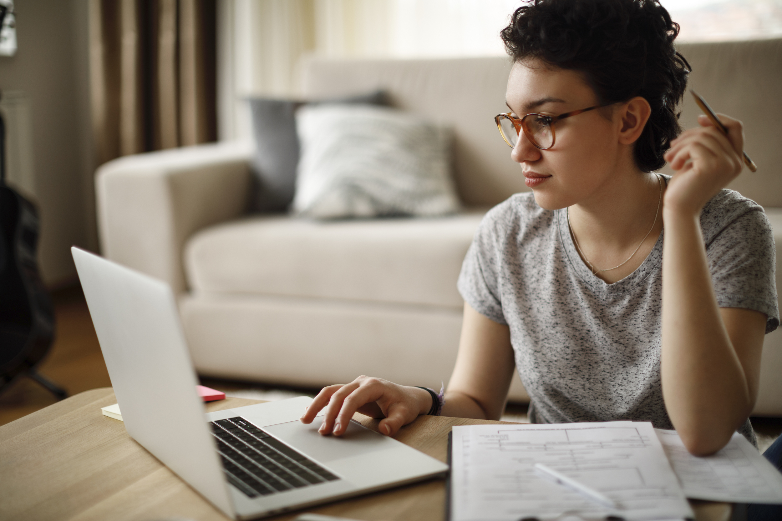 young woman working at home