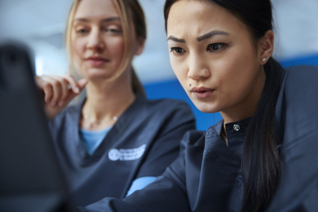 Alliant Nursing Student looking at Screen