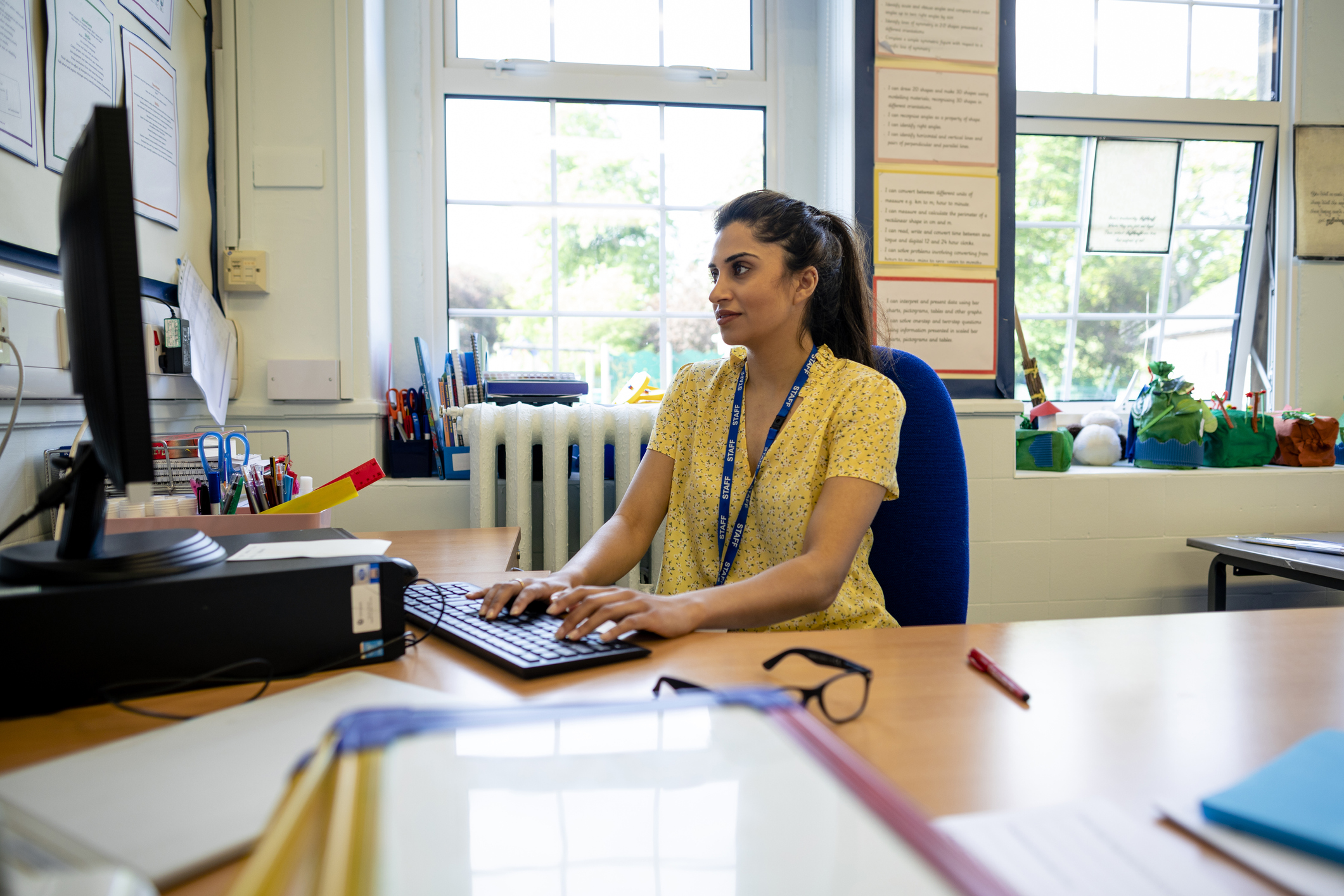 teacher at computer