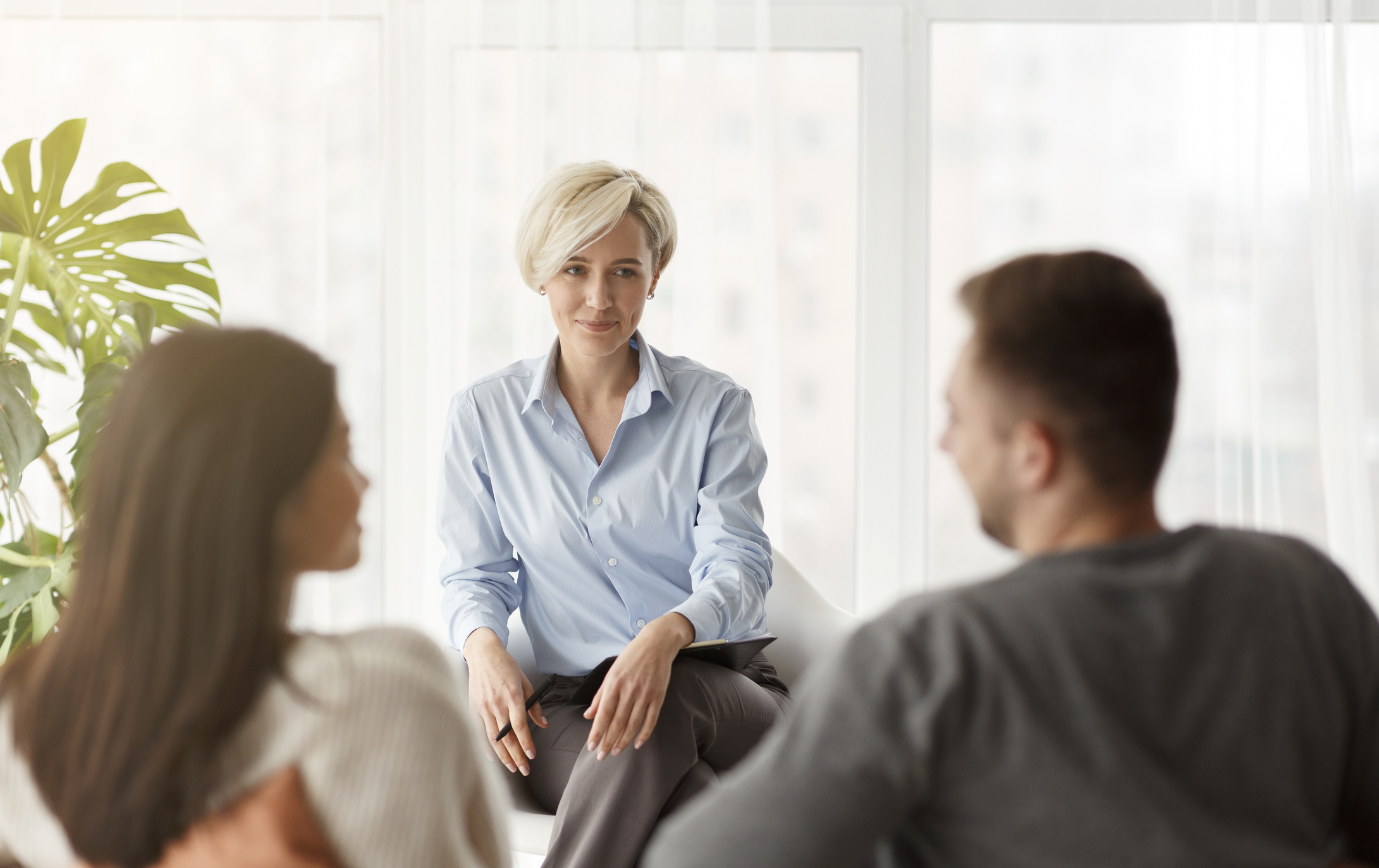 therapist talking to a couple