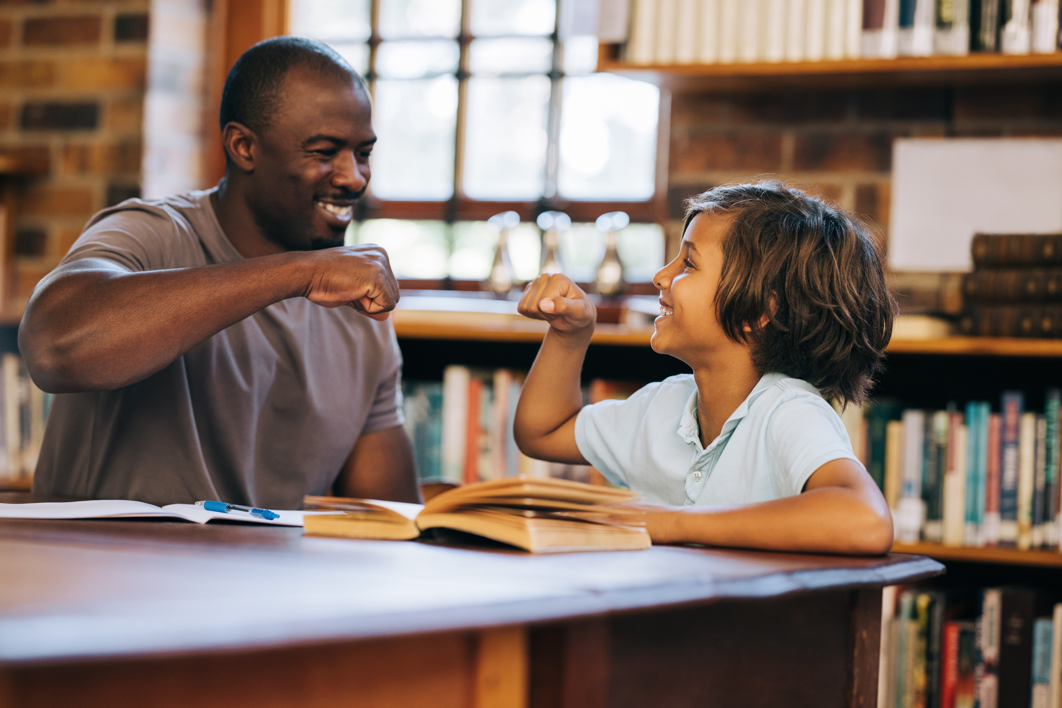 teacher talking to student