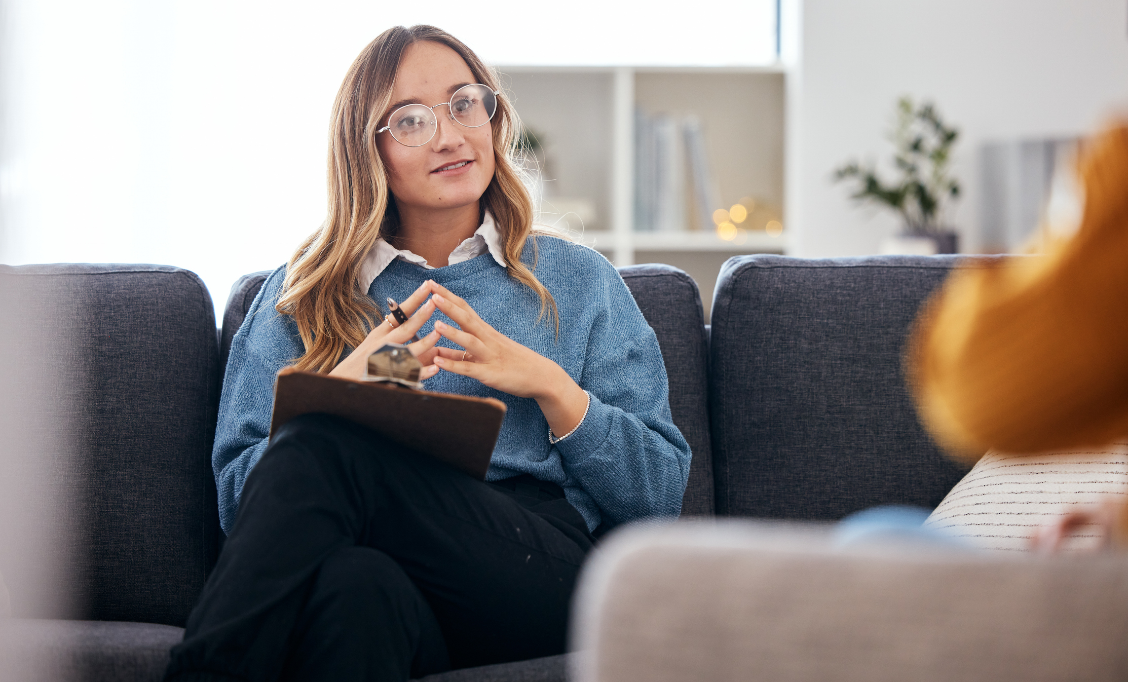 woman talking to another person