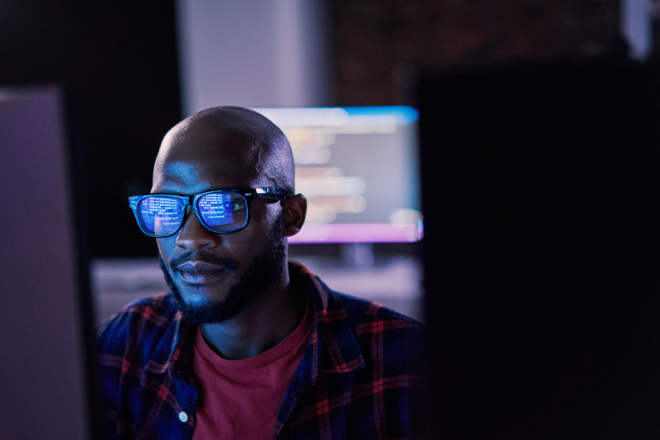 man looking at a screen