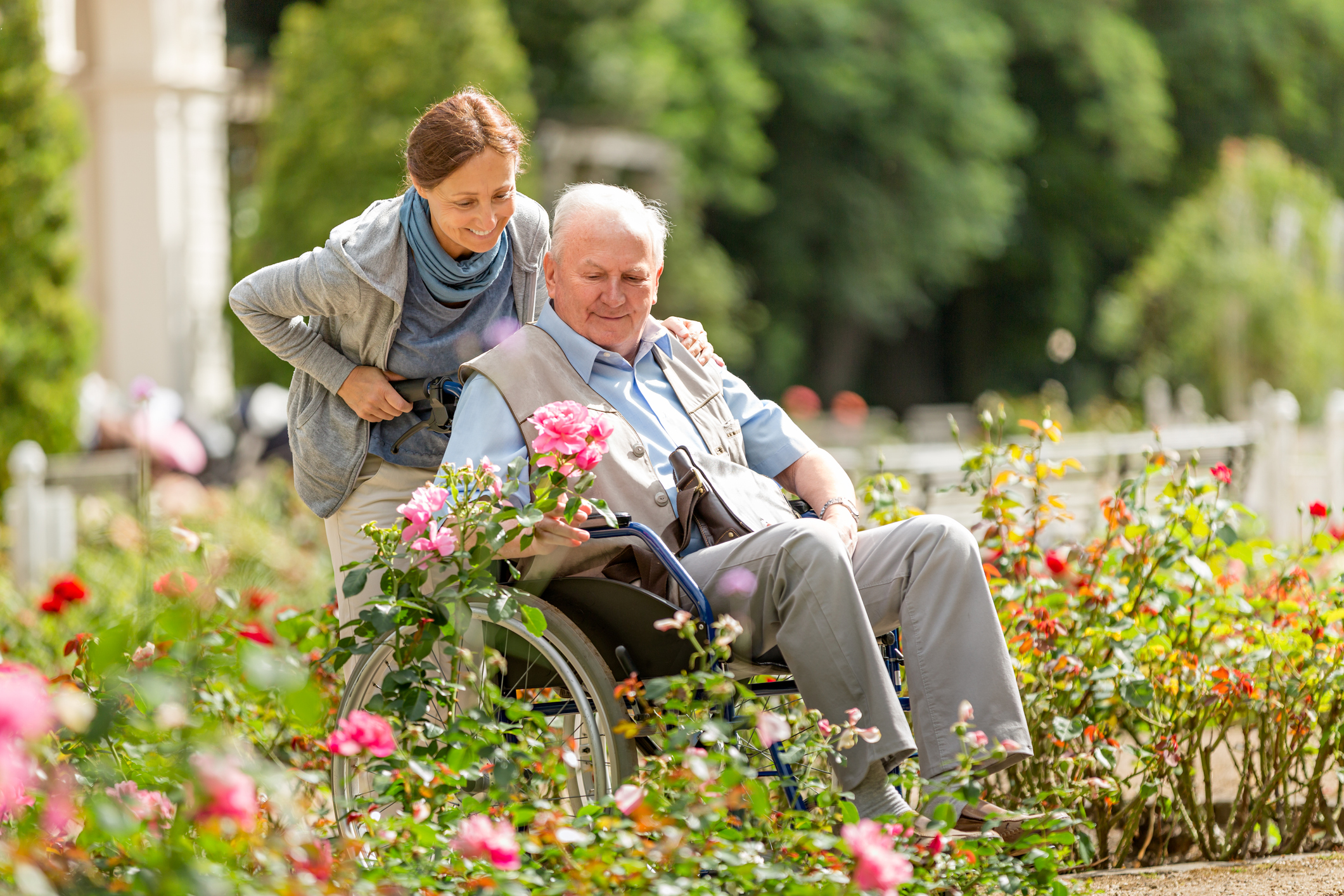 woman and child in flower field