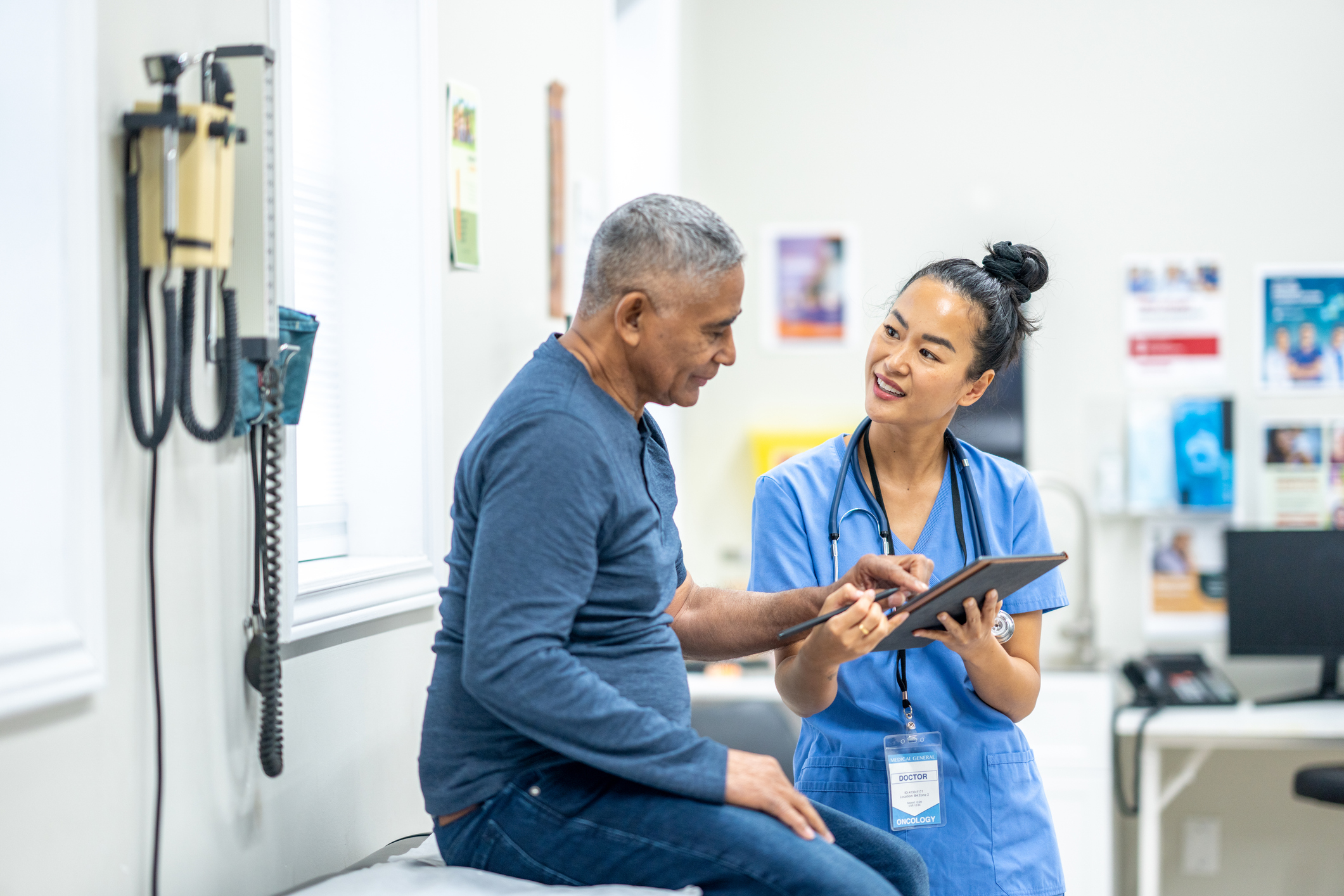 Nurse helping an older man