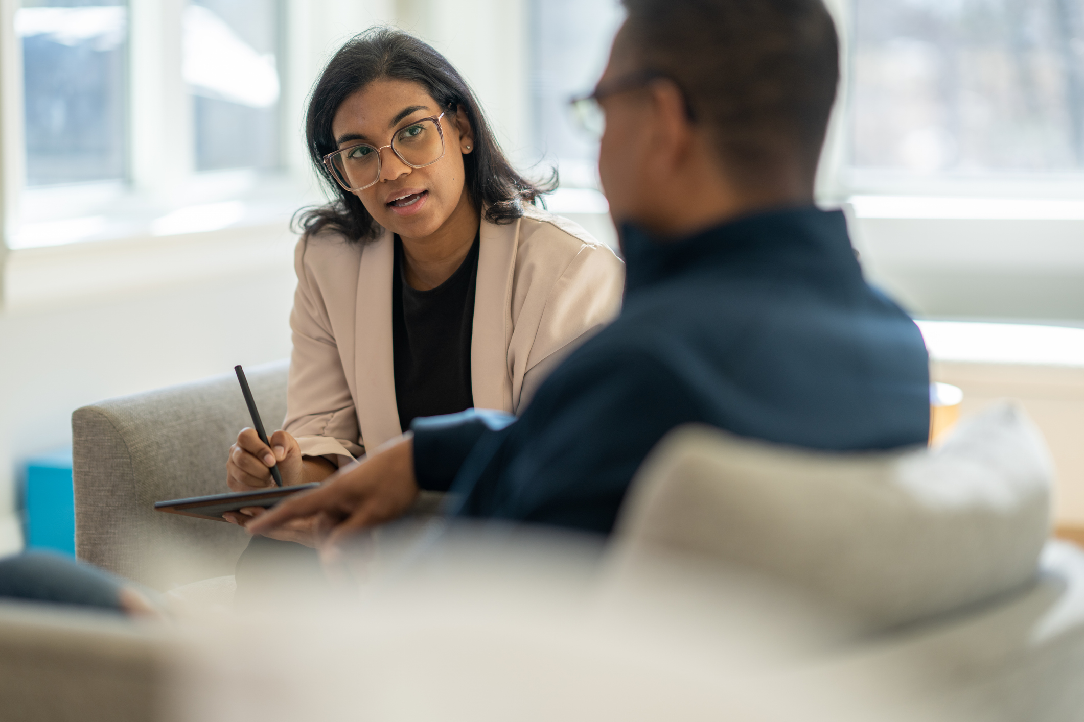 therapist talking to a man