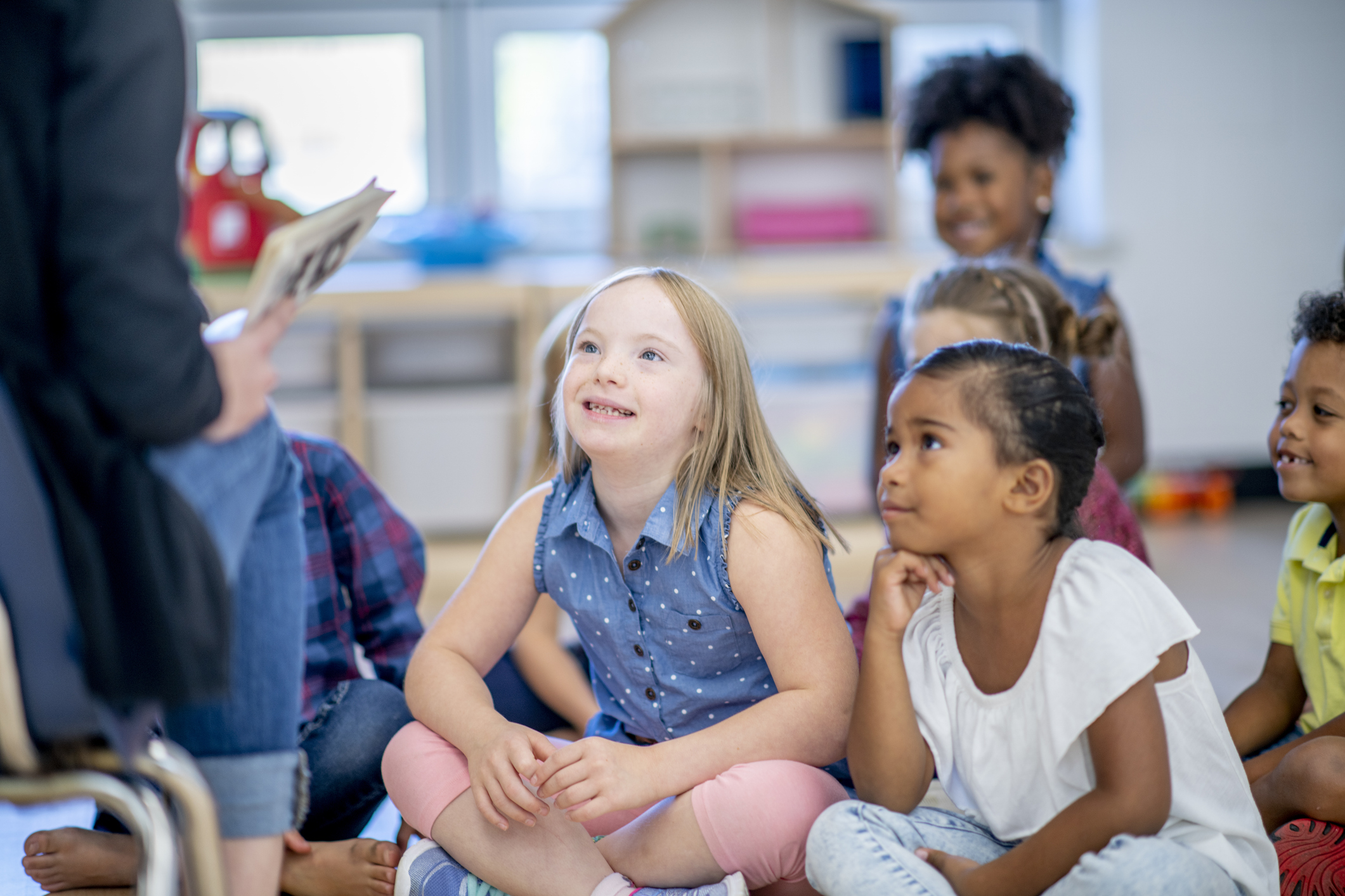students listening to teacher