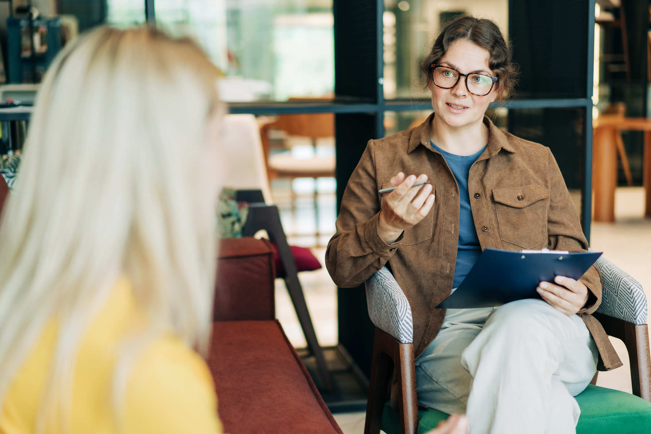 Psychologist talking to woman