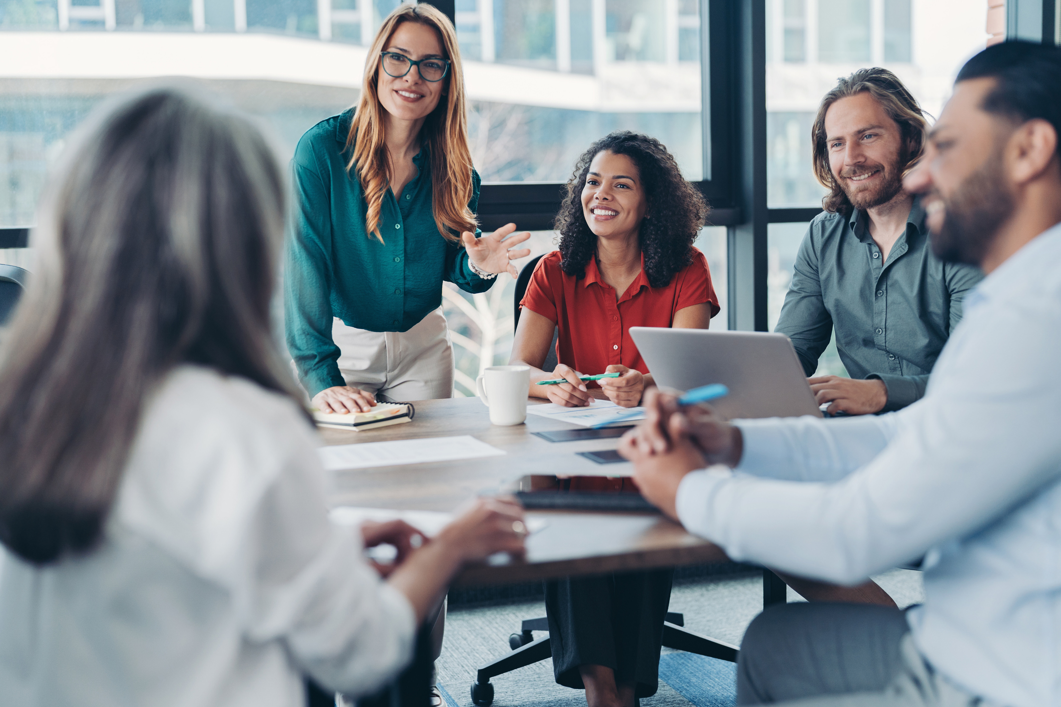 group of business people meeting around a table