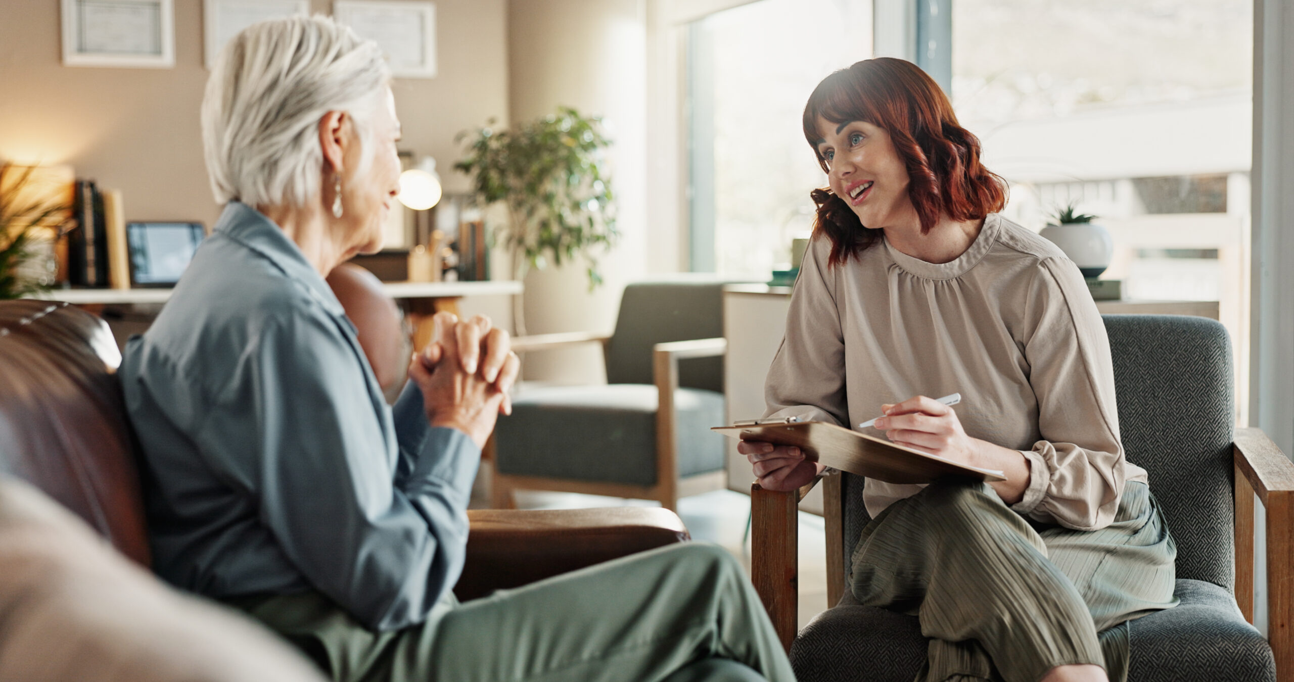 therapist talking with older woman