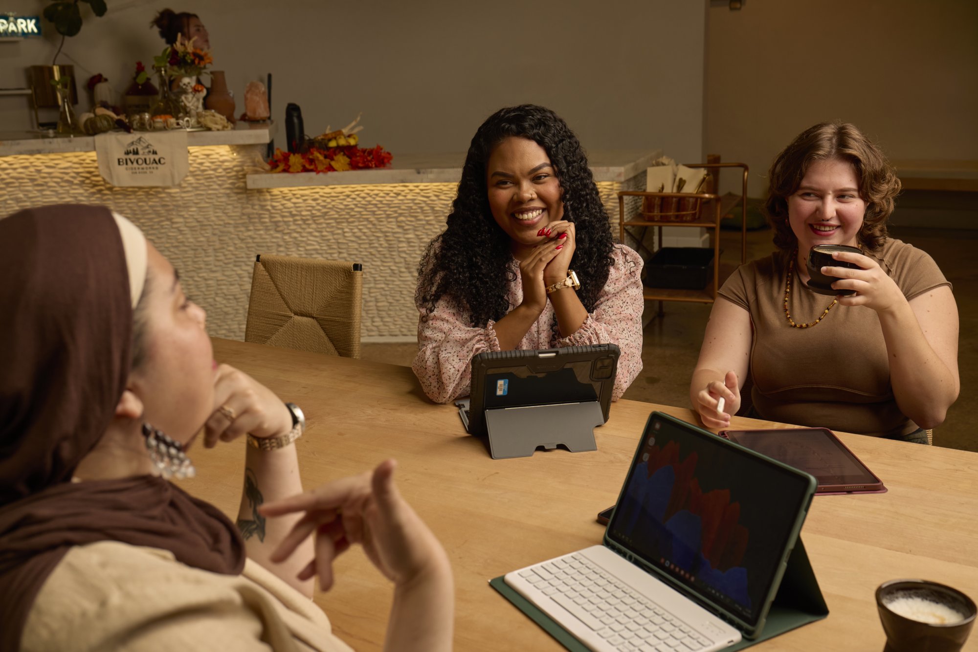 A group of women sitting at a table